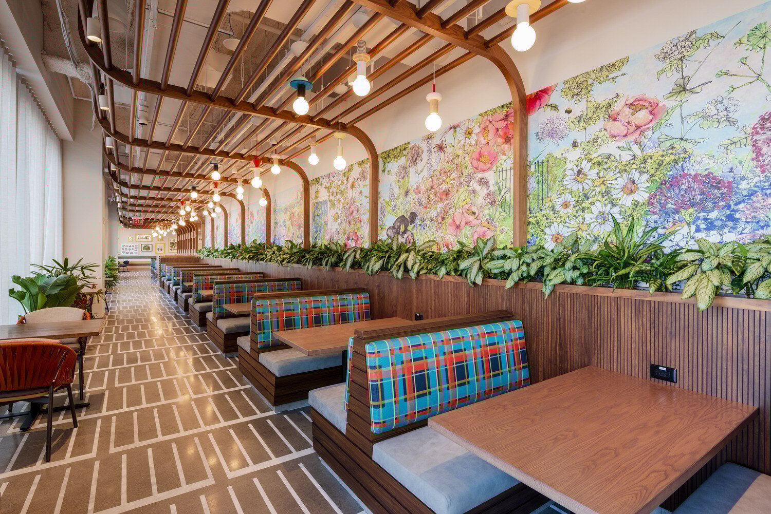 A room full of booths and tables