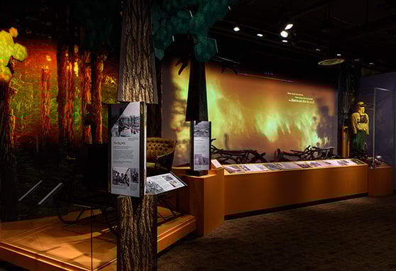 A digital recreation of a forest fire – the Big Burn – surrounds visitors at the Idaho State Museum in Boise, Idaho.