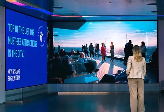 A large static LED video wall at View Boston draws visitors into the experience with panoramic visuals, digital cityscapes and curated content that enhances the observation deck’s storytelling.-1
