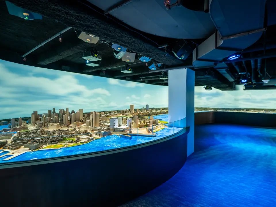 A multi-projector and speaker installation maintained by Electrosonic, delivering seamless audiovisual performance.