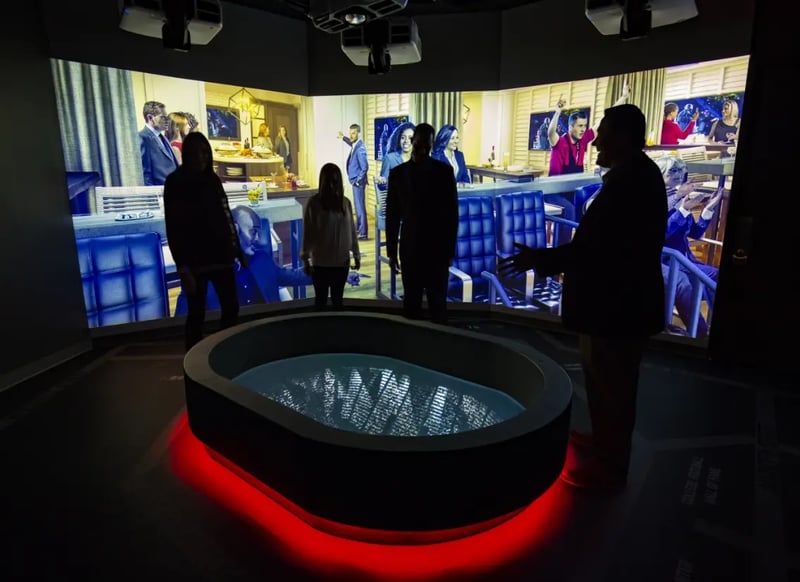 An Electrosonic representative walking a customer through their new AV solution