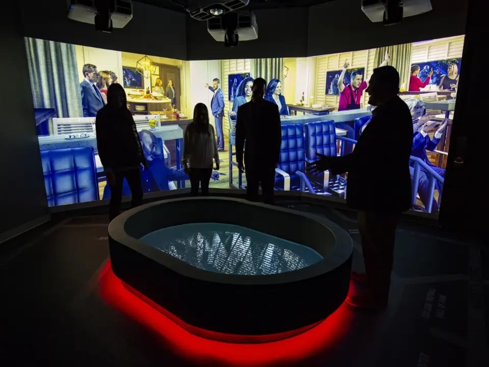 An Electrosonic service representative walking a customer through their new AV solution