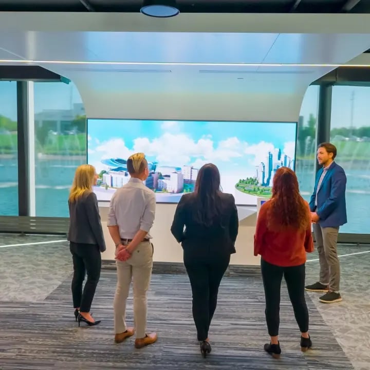 An Electrosonic service representative walking a group of employees through an on-site training exercise