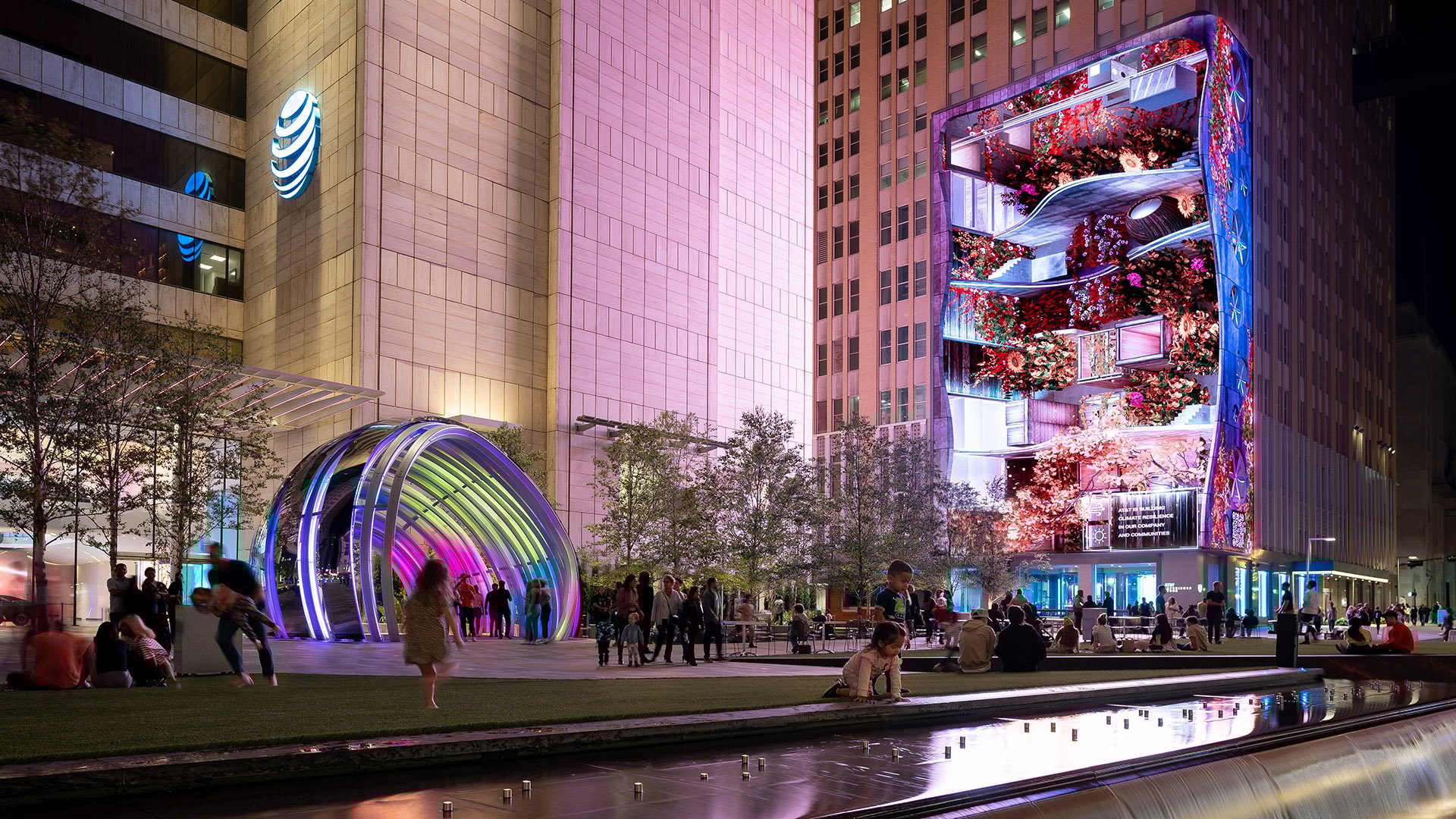 The AT&T Discovery District showcasing its vibrant large-scale digital activations that transform the space into an immersive urban experience. Towering LED displays and interactive screens create a dynamic visual environment in the heart of downtown Dallas.