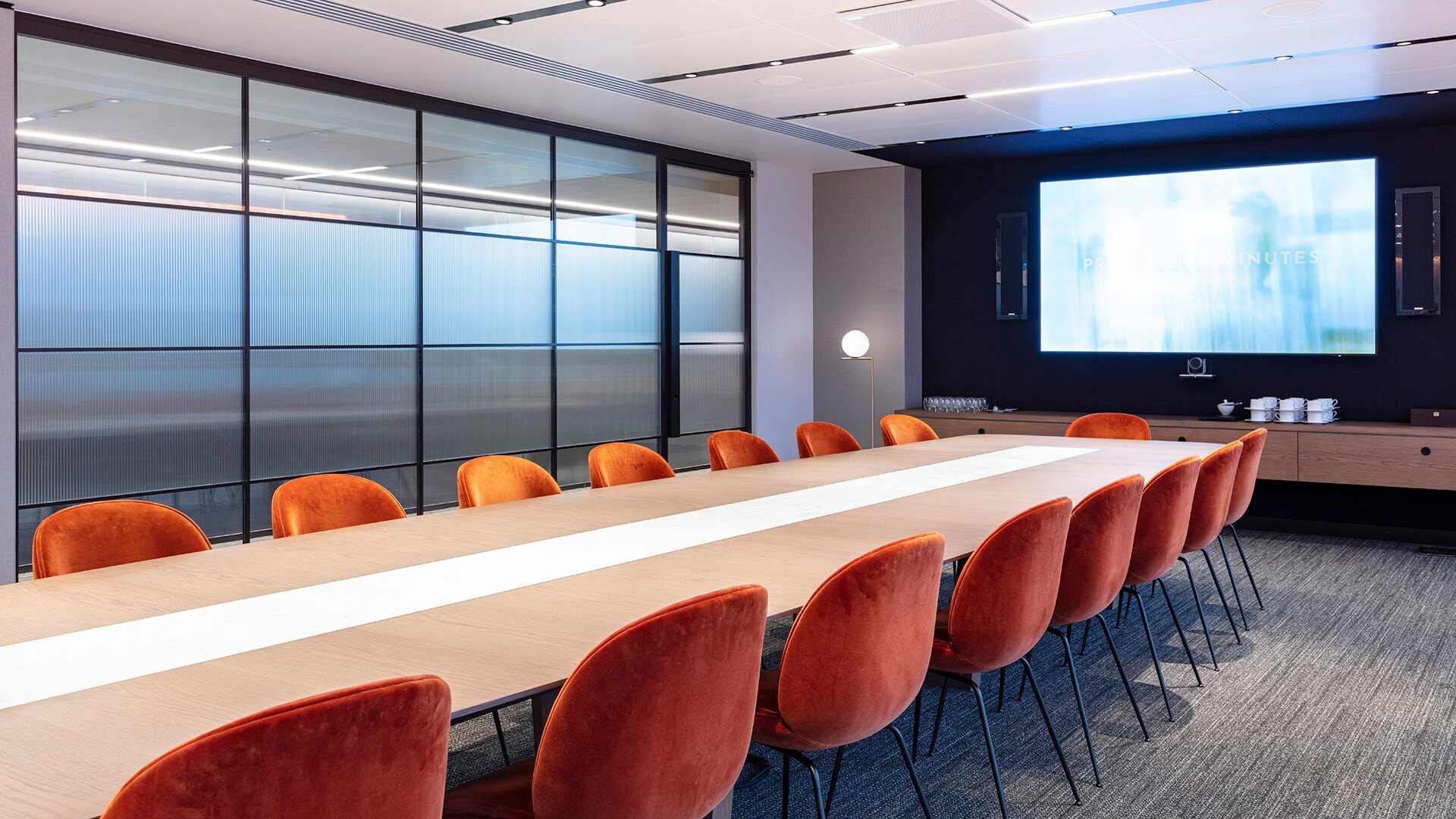 Boardroom at Ashursts London HQ with modern furniture and meeting room technology.