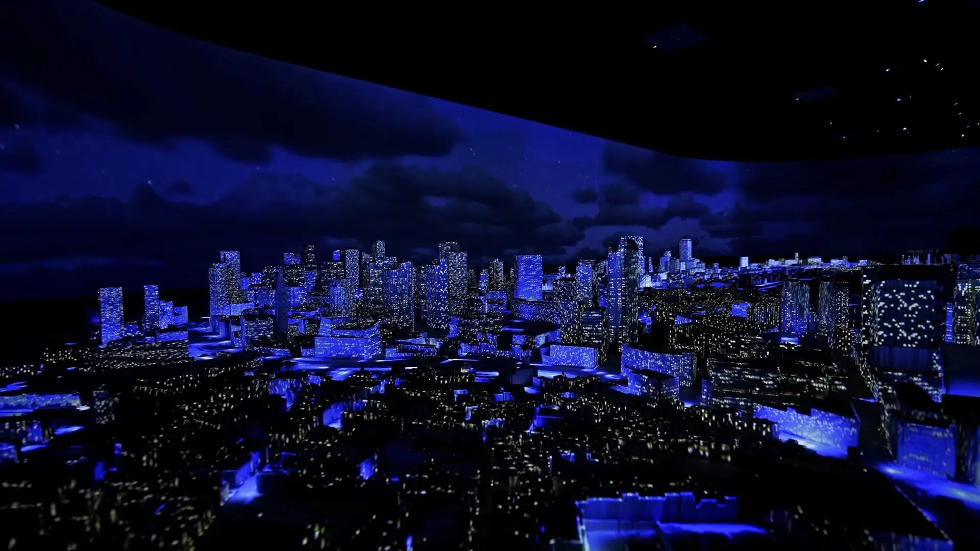 At Boston 365 guests then encounter a 50-foot-wide 3D scale model of the city made possible by 31 seperately programmed projectors playing content on the backdrop and the model city itself.