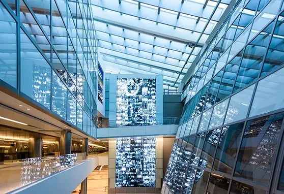 At LAX’s Tom Bradley terminal, expansive digital walls offer travelers real-time flight data, multilingual instructions and entertainment content.