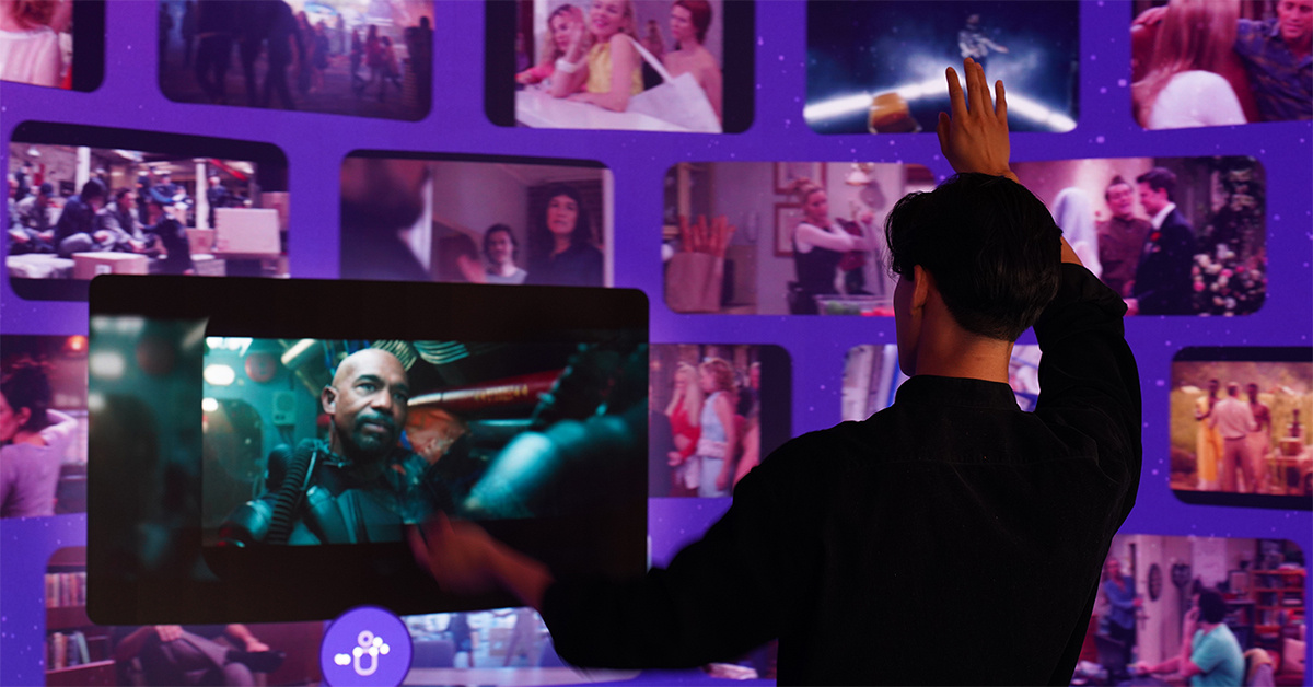 Guest interacting with a high immersive AV experience within a retail store.