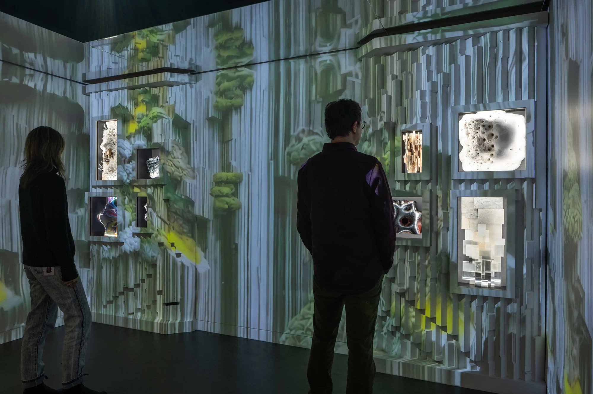 Certain Measures Recombinant Room - People looking at the artwork on the wall.