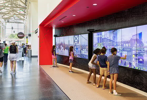 Children interact with video wall displays at Philadelphia’s Independence Visitor Center.