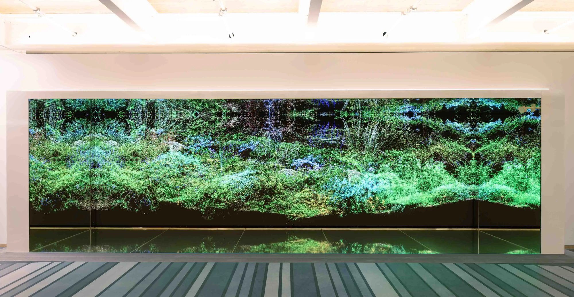 Clement Valla Ambient Mode - Reflecting LED walls displaying green media