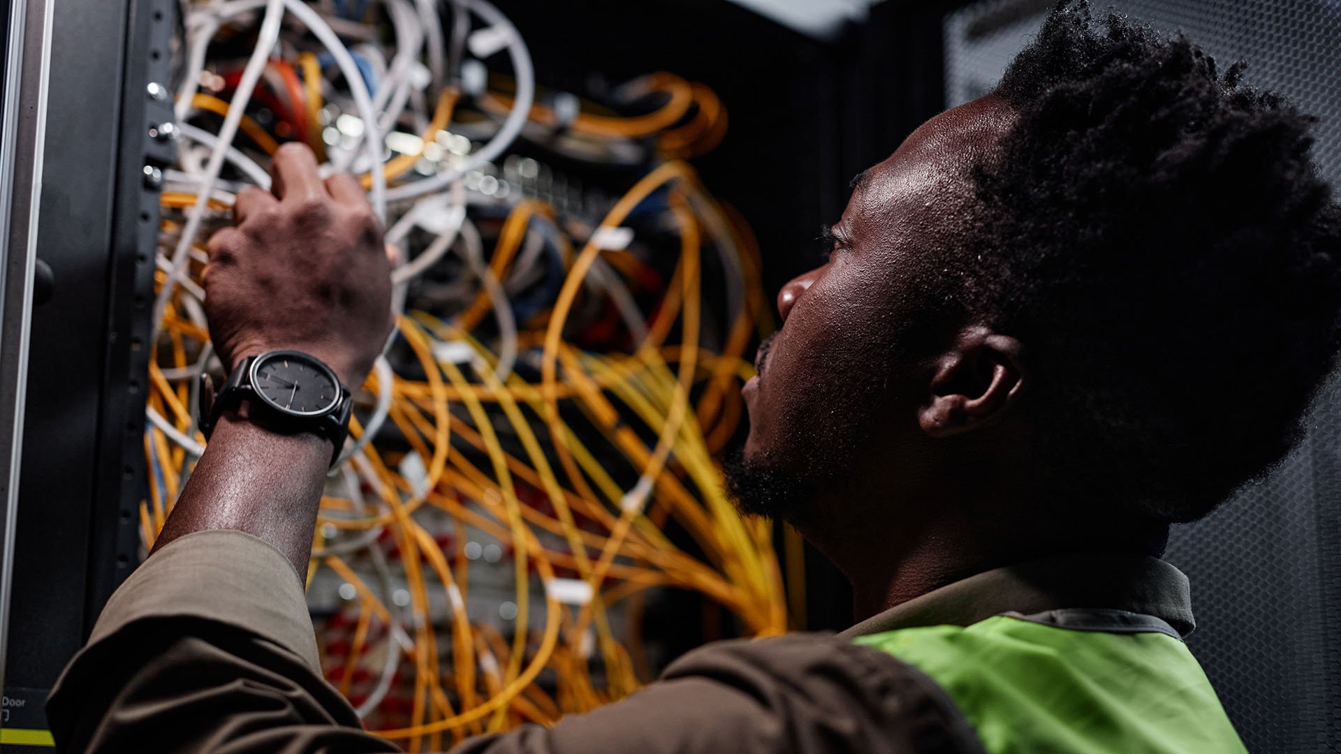 Electrosonic Service Team Fixing an AV System.