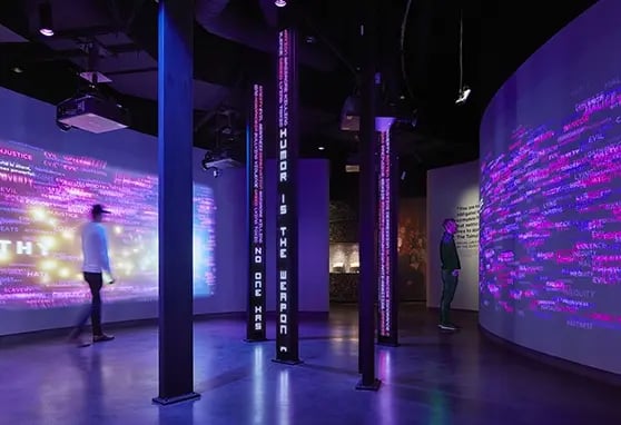 Interactive displays and synchronized media immerse visitors in social justice stories.