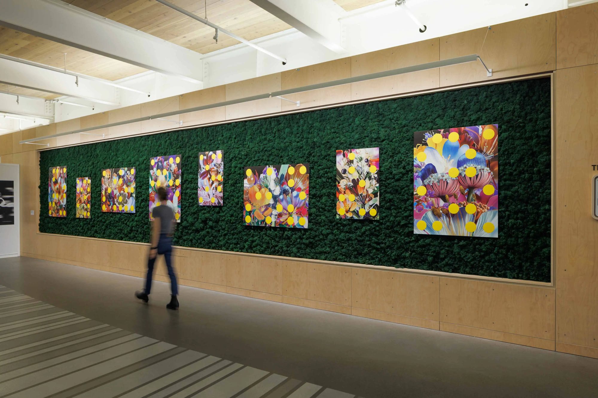 Linda Dounia The Garden Eternal 4778 - 8 paintings on a wall of green grass.