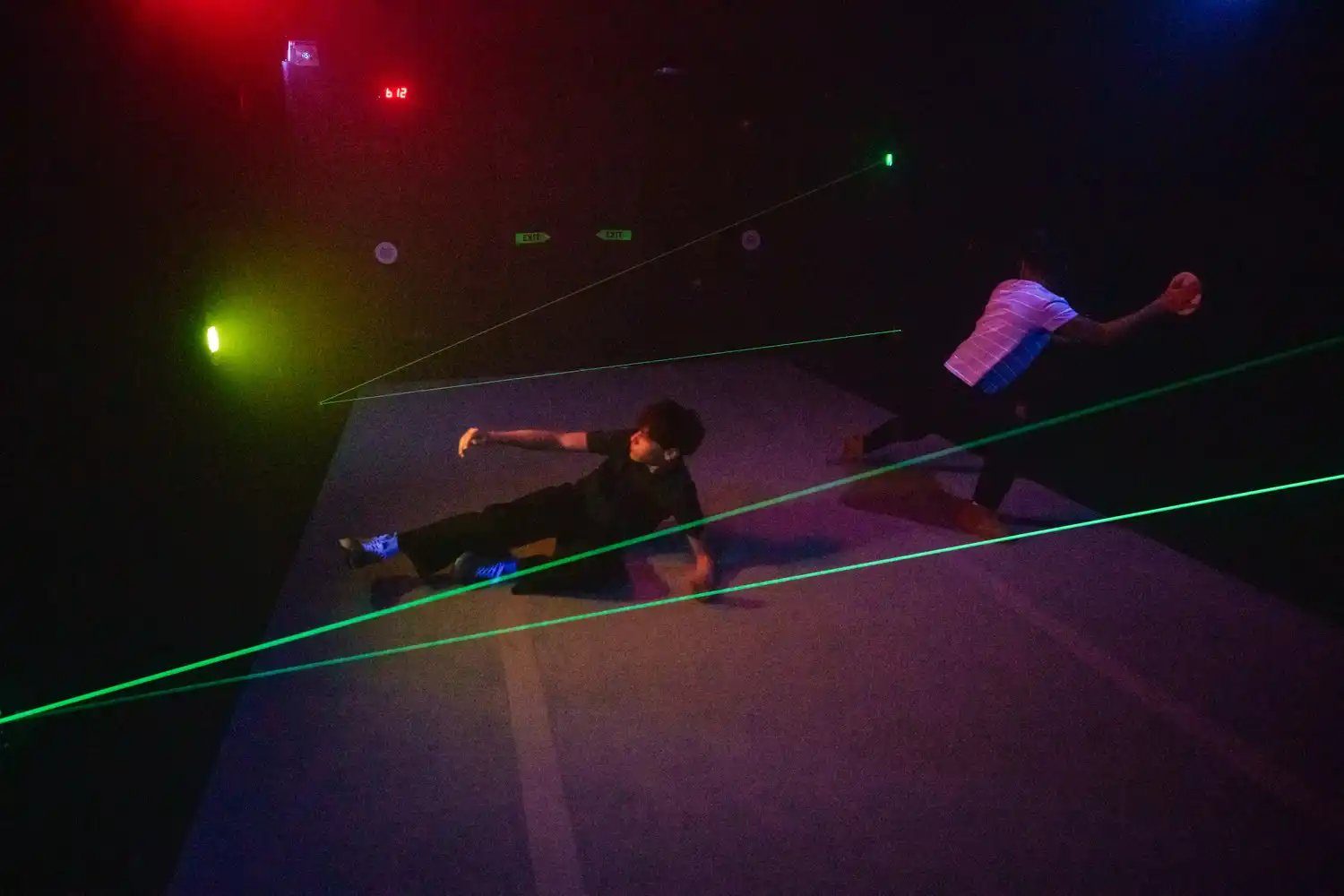 Two people playing laser tag.
