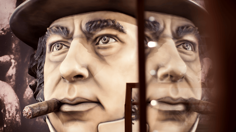 Large bust of Brunel's head smoking a cigar. 