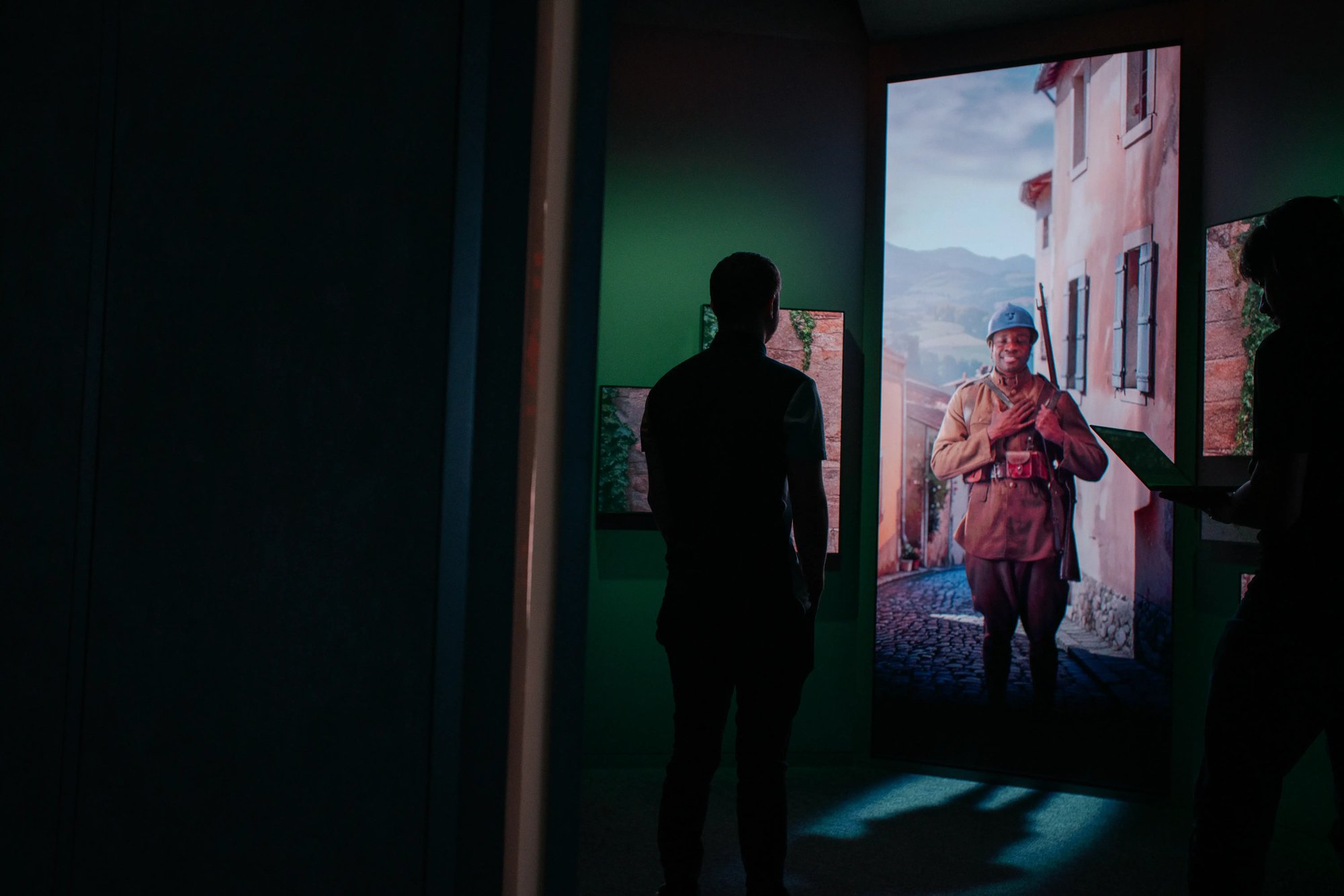 A person looking at a character on the screen while interacting with the character.