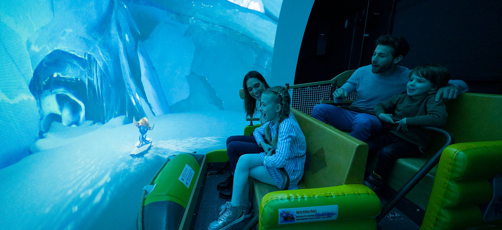 A family enjoying the experience on the Snorri Touren Dark Ride.