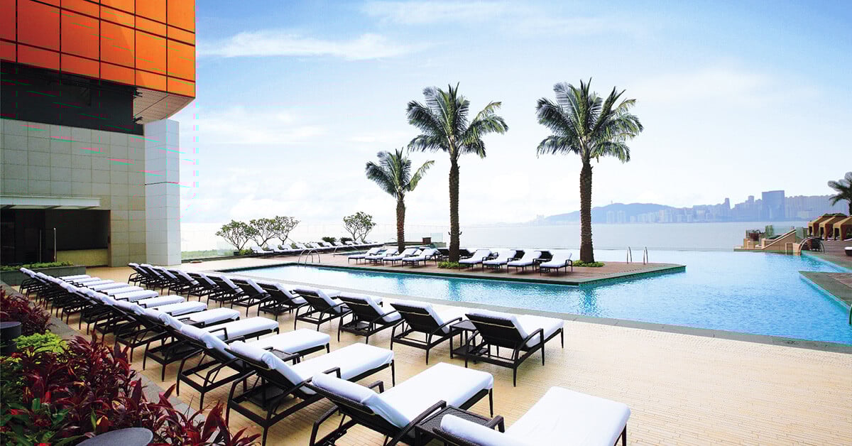 MGM MACAU’s infinity pool, where panoramic views of the South China Sea meet sleek loungers and tropical serenity in the heart of the city.