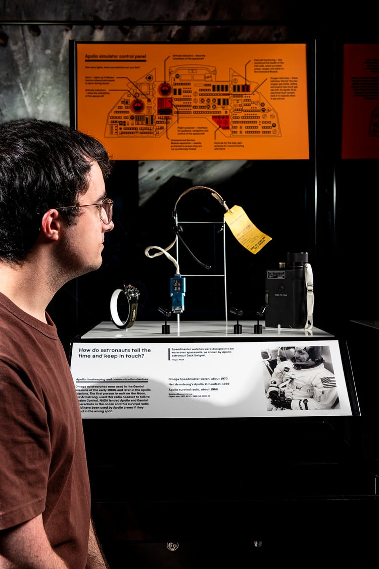 Man looking at wire exhibit.