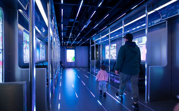 Guests walking into the L-Train experience at Chicago Skydeck. 