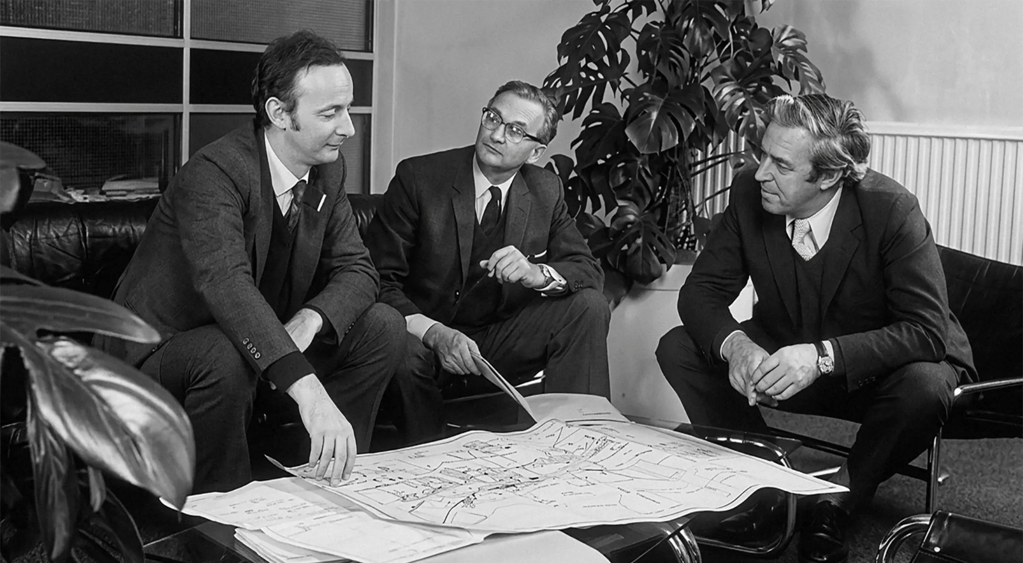The three Electrosonic founders having a discussion about AV technology in the early days of Electrosonic.