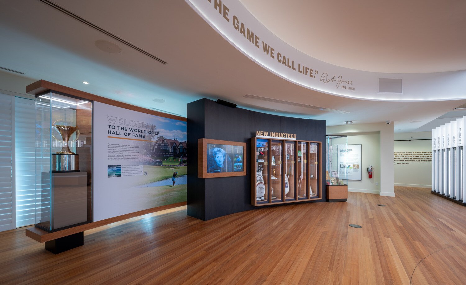 Side view of a screen and a trophy case beside the lockers exhibit