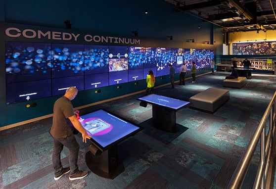 Visitors can register their personal profile at booths before they enter the National Comedy Center in Jamestown, New York.