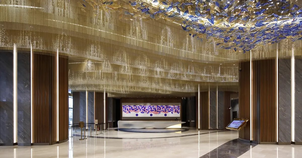 Visitors to the MGM Cotai lobby can check in at the front desk or via a golden touchscreen centrally located in the lobby.