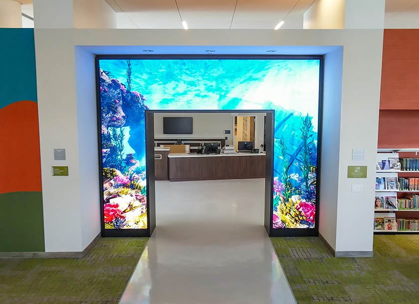 Whittier Public Library features modern audiovisual enhancements, including digital information displays, integrated sound systems, and interactive media stations that support learning and community engagement. These AV elements enrich the library experience by providing dynamic access to information, events, and educational content.