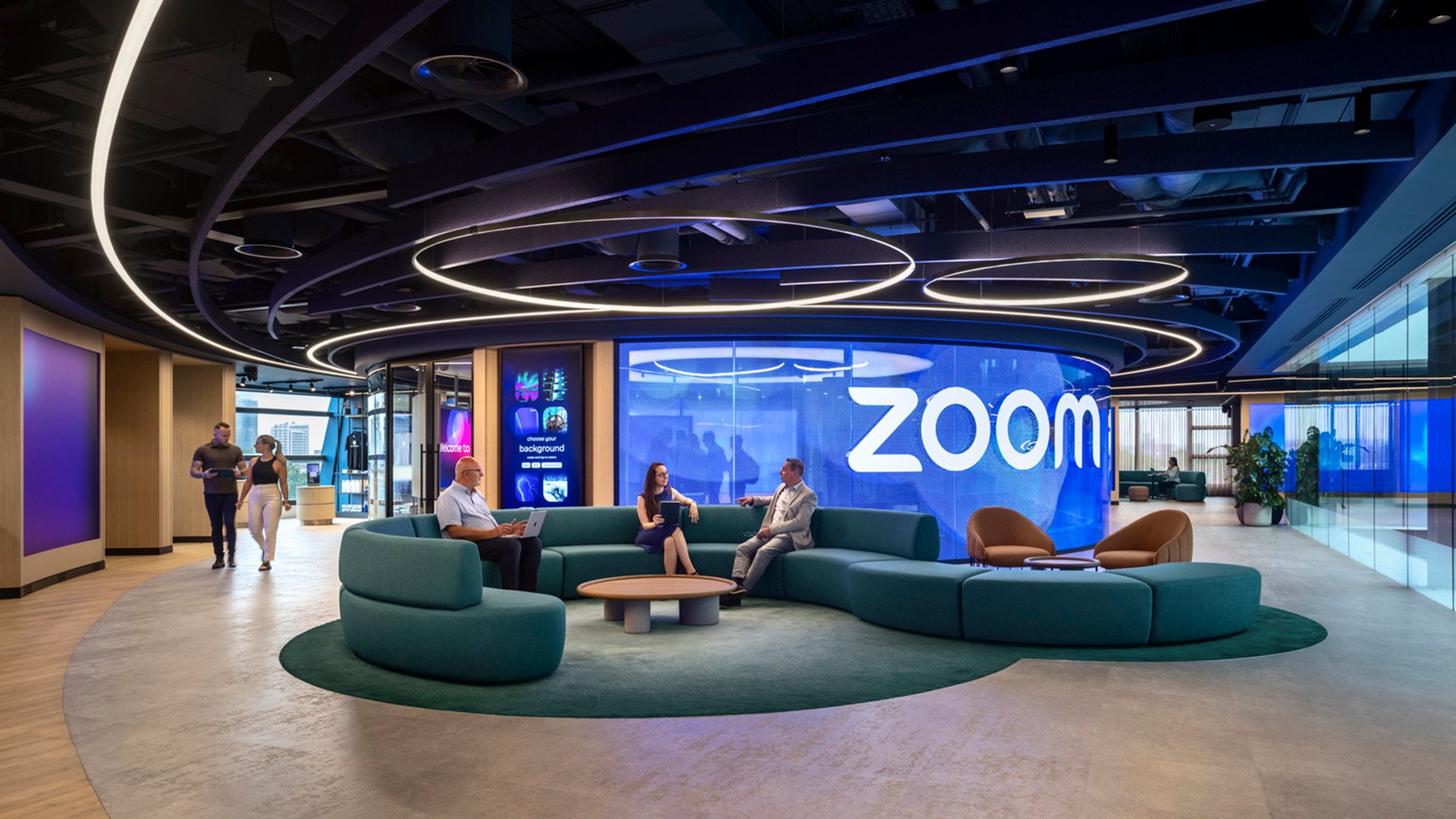 Employees and customers congregating around the Zoom Experience Center in London.